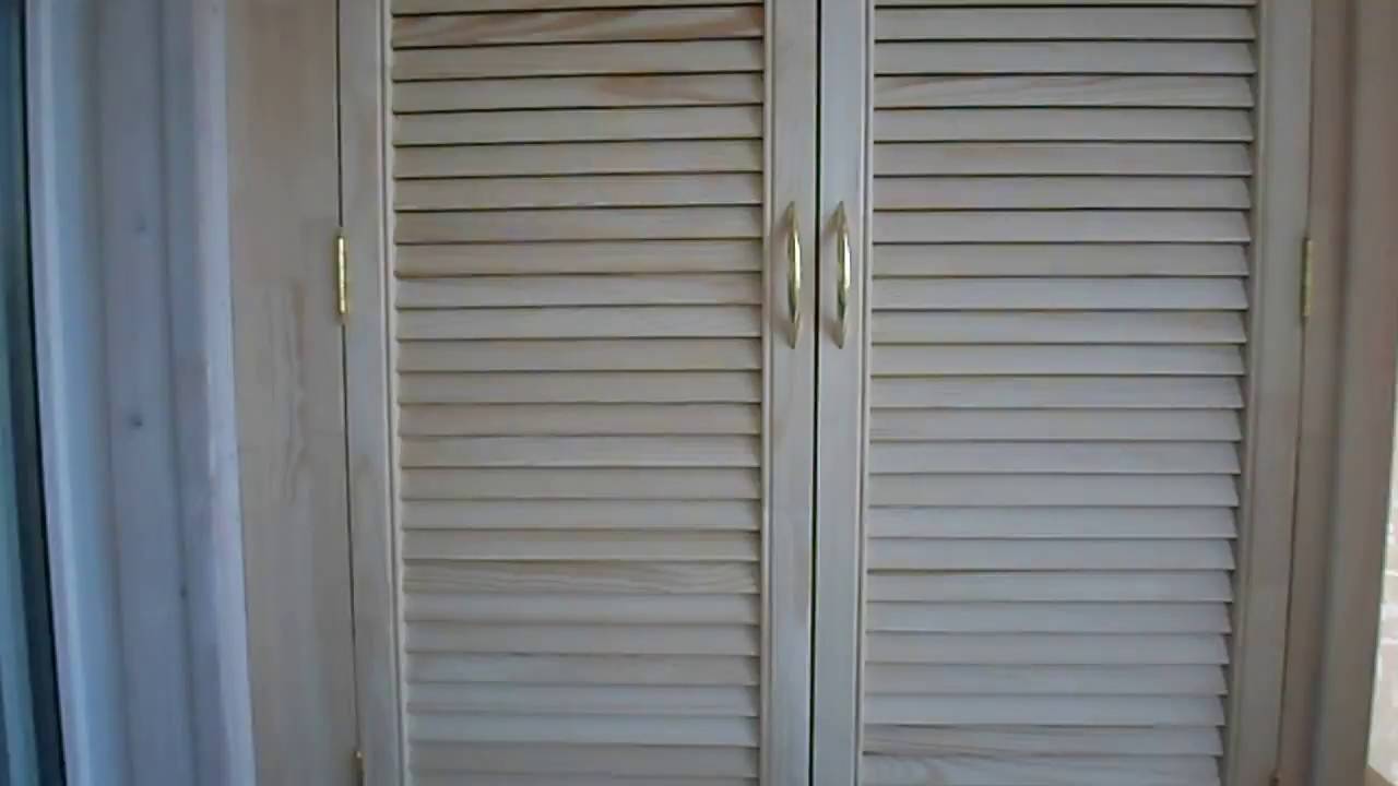 Двери-жалюзи: деревянные, пластиковые, металлические